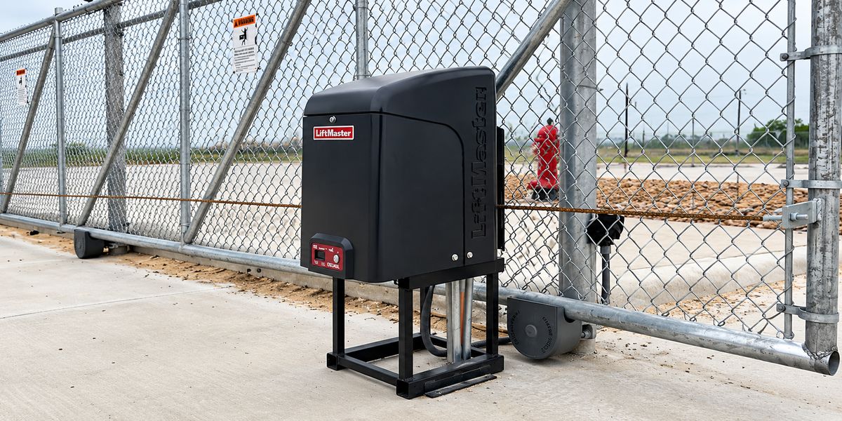 Slide gate operator installed on a commercial chain link gate